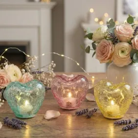 Bomboniera cuore in vetro craquelé con luce LED, ideale per matrimoni e cerimonie. 8,5 cm, 3 colori, con confetti e bigliettino.