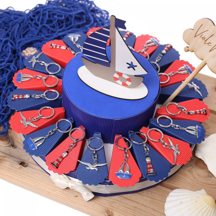 Bomboniera Tris Tema Mare Barca a Vela, Gabbiano e Faro su Torta Bomboniera