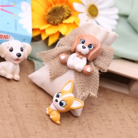Bomboniere battesimo su sacchetto cagnolini calamita