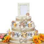 Bomboniere Comunione Statuine Cagnolini Fortunati su Torta multipiano