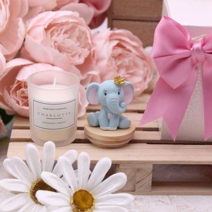 Elefantino bimba con candela battesimo bomboniera confezionata viale magico bomboniere