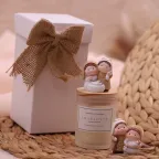 Bomboniere Battesimo candele profumate con Sacra Famiglia confezionate Prima Comunione