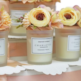 Decorazione Floreale: Candele adornate con pick di fiori artificiali rosa pesca