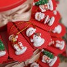 Composizione bomboniere di Natale a forma di torta con astucci portaconfetti farciti da cinque confetti e un bigliettino