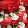 Tris di calamte con Colonna Romana, corona d'alloro, tesi e diploma di laurea