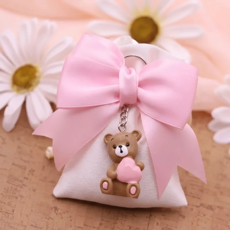Orsetto millecuori portachiavi su sacchetto per battesimo bimba