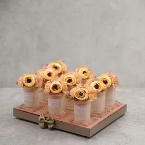 Candele con Fiori Cipria