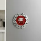 Magnete Corona d'Alloro con Tocco e Libro in Metallo Cromato