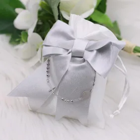 Sacchetto con bracciale rosario argento per evento sacro