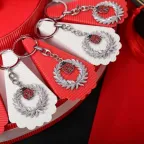 Torta Bomboniere Laurea con Portachiavi Corona d’Alloro e Coccinella