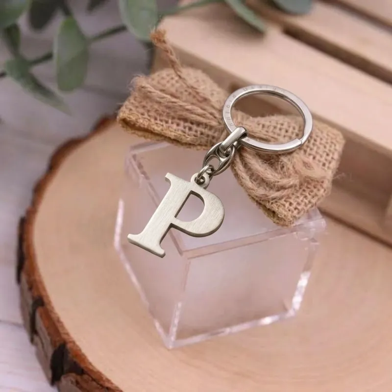 Plexiglass confezionato con portachiavi lettera "P" bomboniera