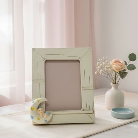 Portafoto con bimbo dormiglione sulla luna confezionato in scatola da cerimonia