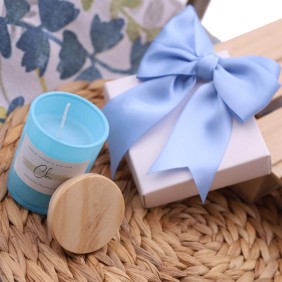 Bomboniera nascita e battesimo confezionata Candela azzurra linea Charlotte