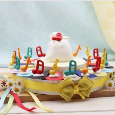 Bomobniera compleanno festa tema musica - torta bomboniera con note musicali