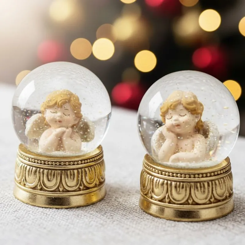 Bomboniera natalizia sfera d’acqua angelo – glitter dorato