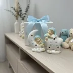 statuina bimbo sulla luna